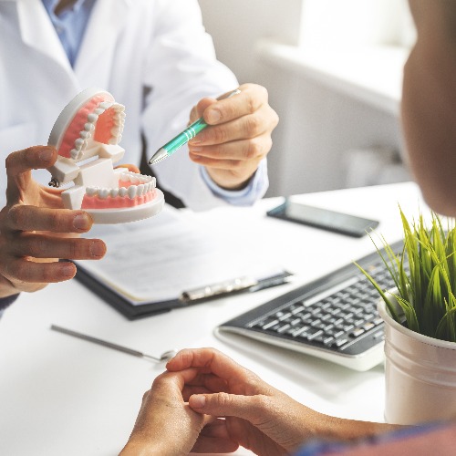 Dentist consultation patient visit at dental clinics office jpg